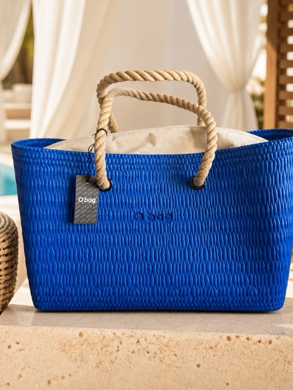 O bag Blue Textured Beach Tote Bag
Royal Blue with Taupe  liner
Rope Handle NWT